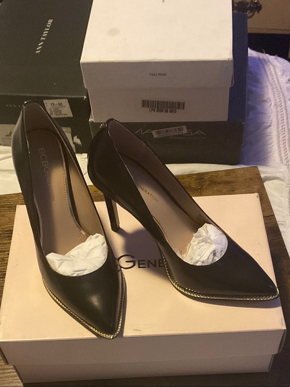 BCBG Black Pointed Toe Pumps with Gold Trim